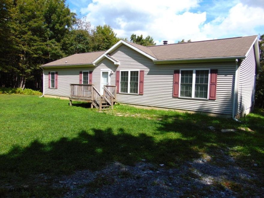 Immaculate home in a very private setting. This 3 bed, 2 bath ranch is part of the Folmont Subdivision which is only a short drive from Shawnee State Park. 5 acres of wooded land with stunning views. Large maintenance free deck, full unfinished walk-out basement, oil forced air heat, first floor laundry and a wood burning fireplace.