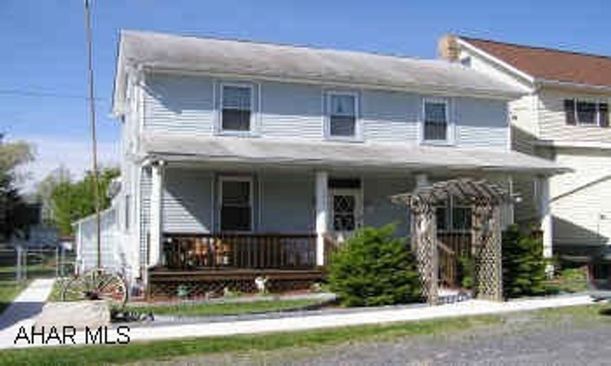 Large 2-story Frame/vinyl with large fenced yard, 2-car garage 2/workshop, public water and sewer. Partially up-dated to include all thermo pane windows, new wiring w/200 amp service, oil H.W. heat, large kitchen w/spacious oak cabinets, above ground pool.