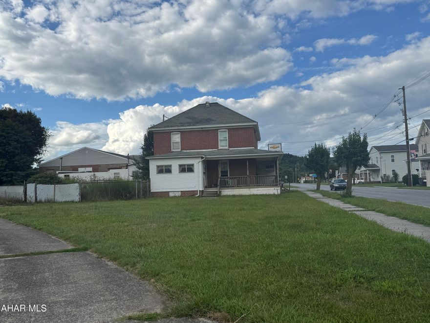 Two story brick set up as a duplex. Handy man special. Roof leaking - dwelling needs rehabed.  Interior inspection at your own risk only with agent.