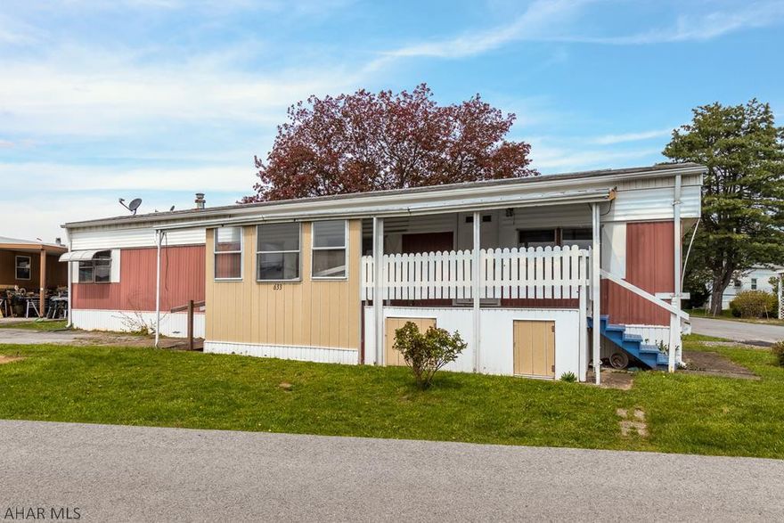 55+ mobile park lliving.  Single wide freshly painted with new laminate flooring.  Covered entryway.  2 Bedrooms 1 Bath and laundry hook up.