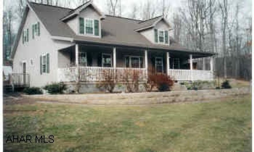 Newer two-story in pristine condition. 13.3 acres, woods behind, beautiful views, private. Full basement, partially finished. Kitchen island and appliances, small barn and shed suitable for small farm animals. Decks.