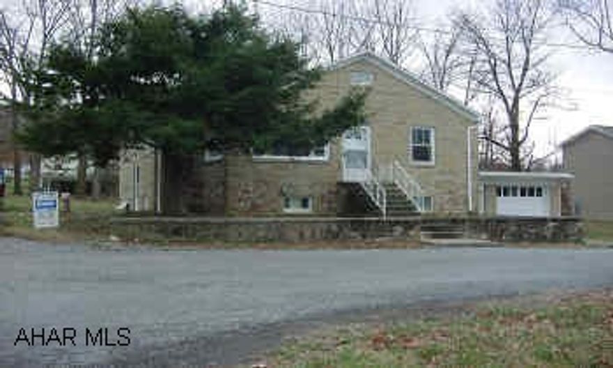 BEAUTIFUL STONE HOME ON CORNER LEVEL LOT WITH GARAGE.  WELL TAKEN CARE OF. BEAUTIFUL PLEASANT VALLEY STONE 1 STORY HOME ON A LARGE CORNER LOT WITH 1 CAR GARAGE.  2 BEDROOM - GOOD CLOSETS, NEWER ROOF, SOME THERMO PANE WINDOWS, NEW - UPDATED BATH, FURNACE, ELECTRIC SERVICE!  CALL MIKE MANGIA.