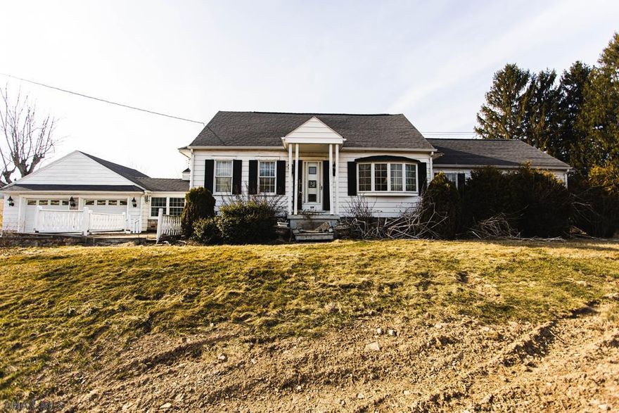 LOCATION, LOCATION, LOCATION!!!  This 3 bedroom, 1.5 bath house sits on 1 acre and has a country living feel, but is still close to everything. New septic system. Spacious kitchen with ample cupboard space. Built in shelving. Laundry room. Wood fireplace. Attached 2 car garage. Bellwood-Antis School District. Don't miss out on all of the potential in this house.