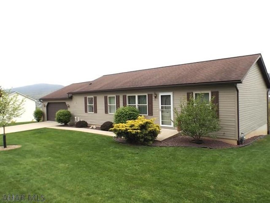 One floor living. Immaculate 3 bedroom, 2 bath home conveniently located in Altoona with a great view. Lower level roughed in for a bath and a wet bar. Attached 2 car garage. Additional 2 rear lots included.