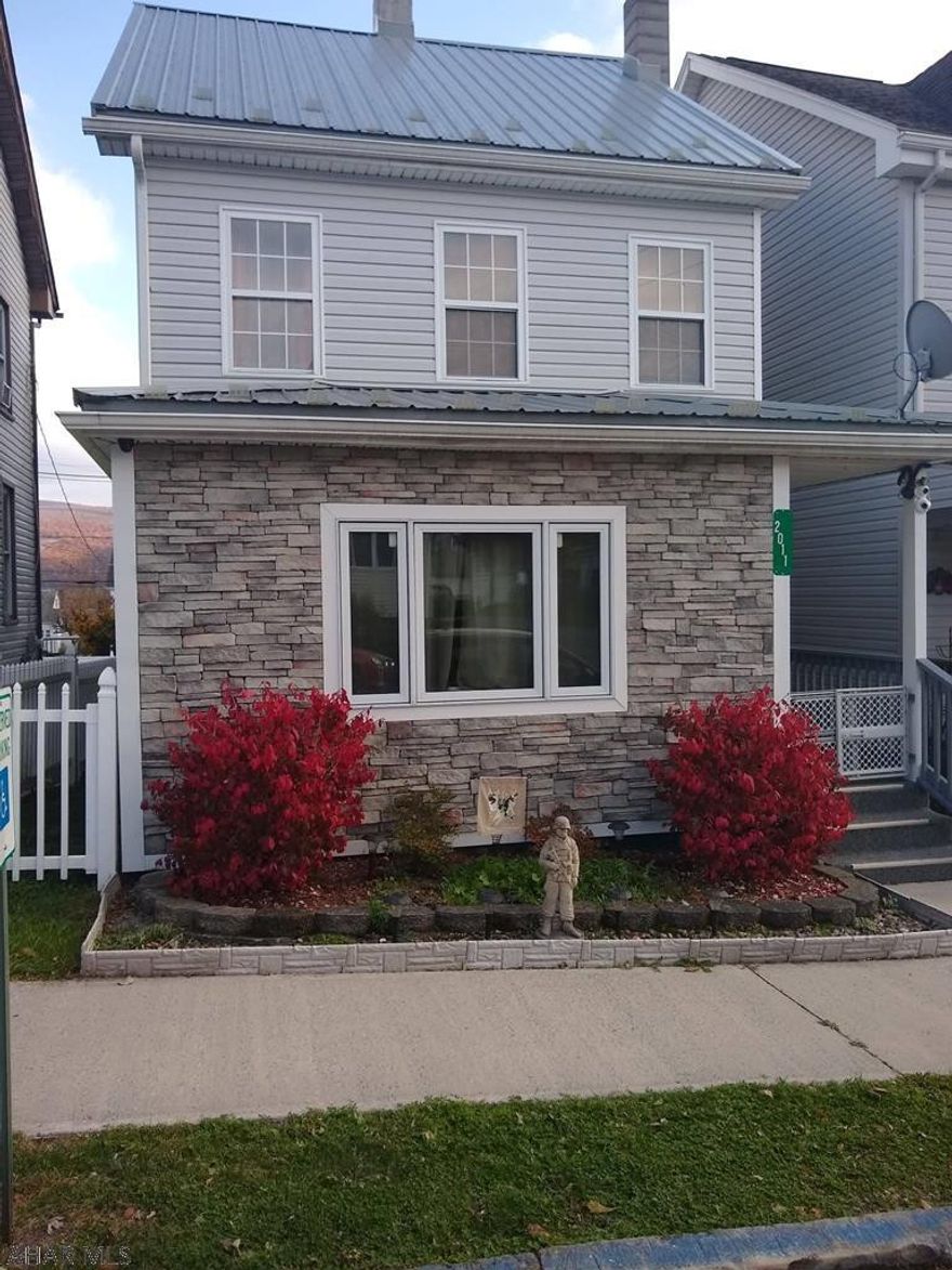 Don't miss out on this little gem. Almost everything is new!  Sellers have done such a lovely job renovating this property, you have to see it!  New metal roof, new vinyl siding and gutters, new carpeting, beautiful new kitchen, new laundry room with toilet (1/4 bath), mud room, new full bathroom on second floor, finished walk up attic (could be another bedroom, office, family room, etc.), new furnace, newer electric, new heat pump (central A/C), above ground swimming pool with deck (salt water treatment system), fenced yard, two stall carport, new windows.. There is little left to do but move in.  Don't let this great home pass you by!  Call today for your personal tour. The heating system offers new radiator designs, and the kitchen is full of many unique surprises.. Come see it!