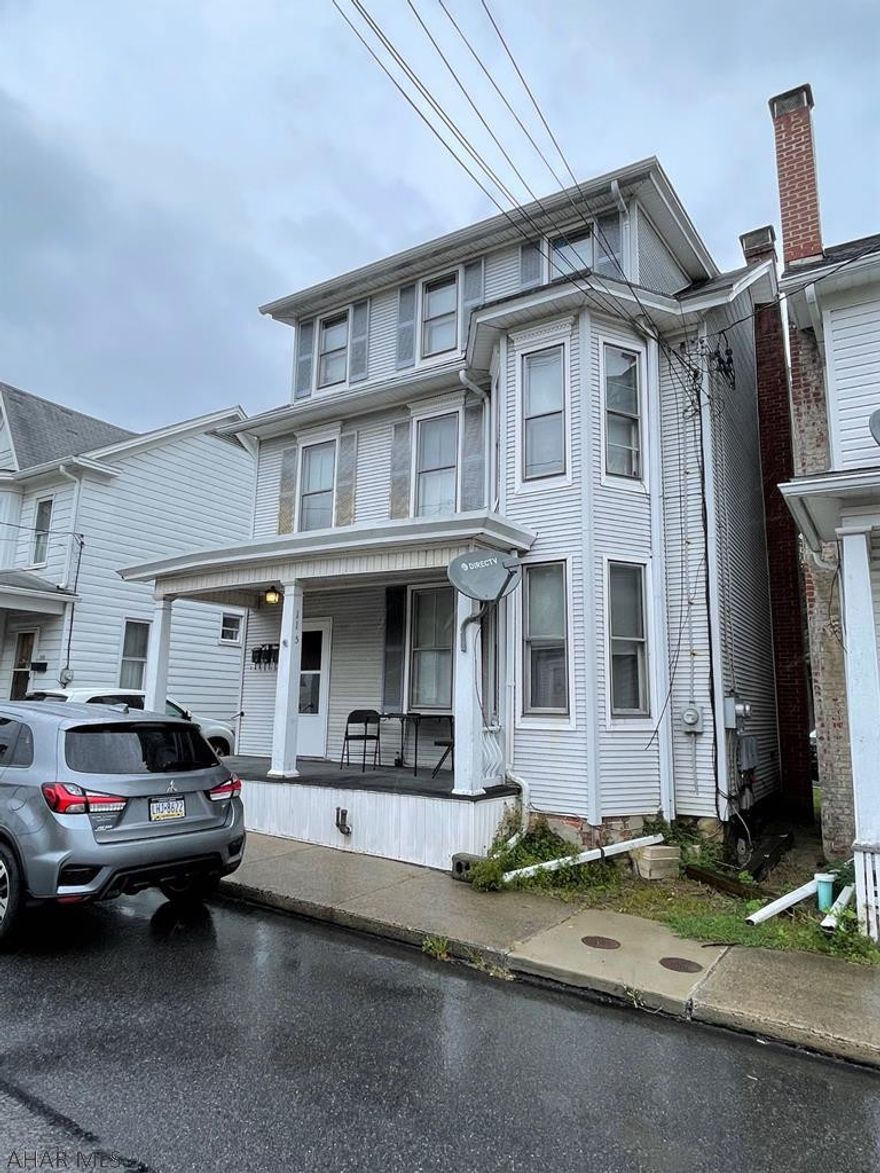 Investment property!!. Three unit apartment building located in the Everett Borough. It has two, two bedroom units and one, one bedroom unit. Separate electric, water and sewer. Owner pays heat. Detached one-car garage that could also be rented and off-street parking.