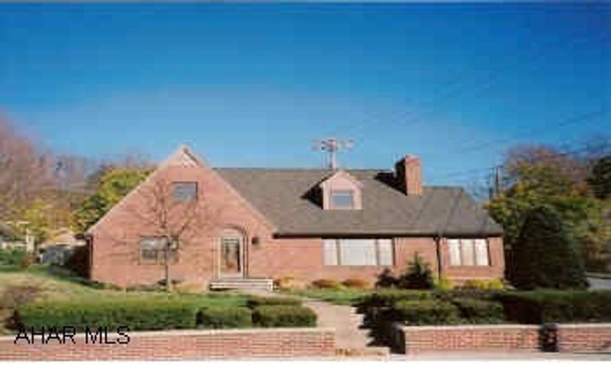 Top of the line 1 1/2 story brick home. 40 year shingle roof, pella windows, very convenient to everything. Brick rear patio and sidewalks, new heat pump/central air, porcelain stone floors, marble counter top, wood fireplace in living room, excellent condition.