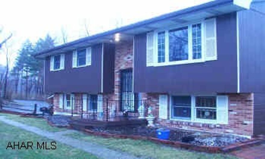 JUST LIKE NEW.  NEW PERGO FLOORS, CERAMIC TILE FLOORS, NEW BERBER CARPET, ROOF 1 YEAR  OLD.  NICE PRIVATE LOT.  POOL WITH DECK.