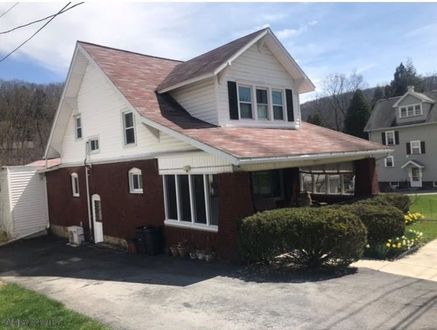 Charming 3 bedroom 2 bath home in Tyrone Borough.  This home features original woodwork with updated charm. The large open kitchen is perfect for entertaining  with an eat in area but also open to the sunroom and formal dining room. The beautiful sunroom have a great view of the back yard and an outdoor deck. The second floor offers three bedrooms, full bathroom and a large walk in closet in the hallway for storage. Call today for more information or your private tour.