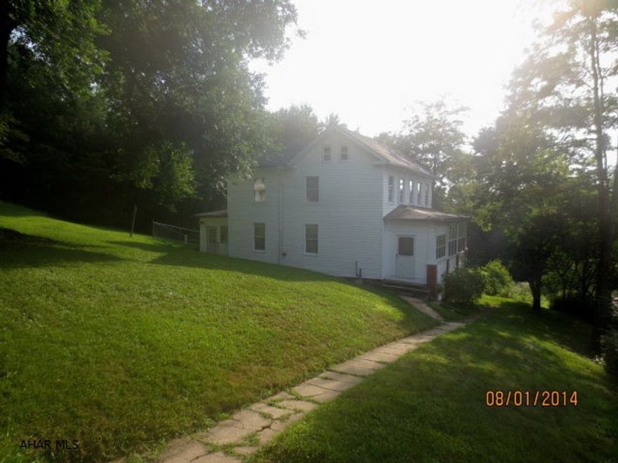 Property offers spacious home,3 car garage, beautiful view, privacy and hunting