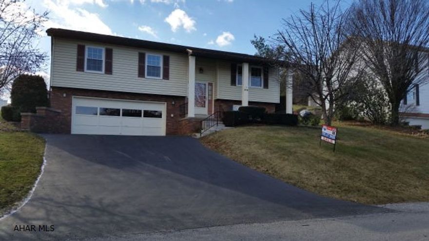 Spacious split level on cozy block in Hollidaysburg school district. Home offers 3 bedrooms, eat-in kitchen, 2.5 baths, fininshed family room, loads of storage and built-ins. This is a must see, priced to sell $189,000.