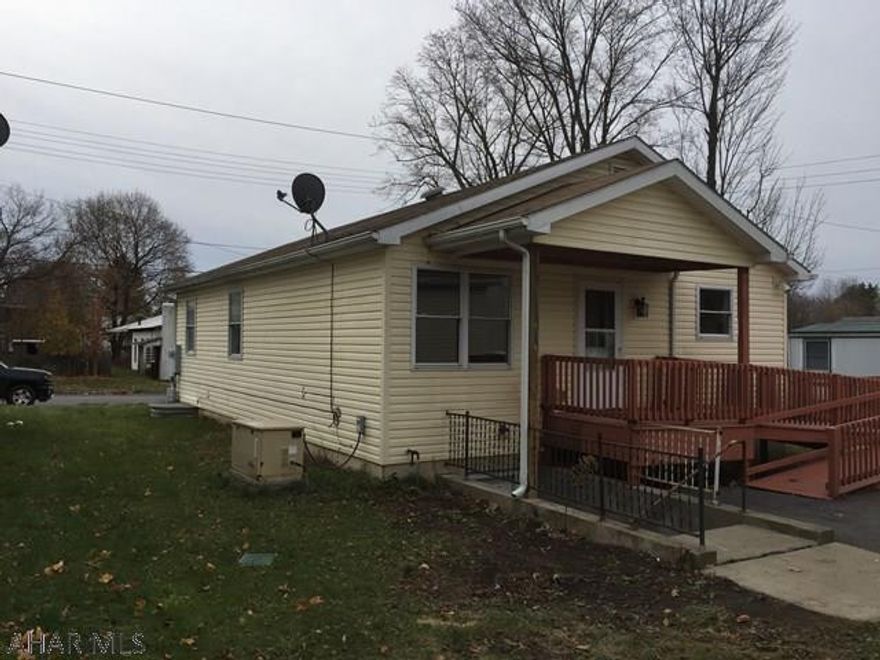 Agent owned.  This is a newer, well build habitat for humanity home.  Clean and ideal for accommodating your extended family.  Has a separate downstairs living space, with its own kitchen, bath, bedroom, entrance and emergency exit.  Home has extra large interior doors and outside ramps for handicap access.  Home is in move in condition.