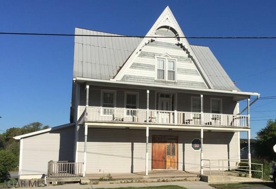 Commercial building with approximately 10,000 sq ft. with unlimited possibilities within a 10 minute drive of Historic Bedford ad Omni Bedford Springs. Known in the area as the Metropolitan Hotel, Bar and Restaurant. A custom-made oak 40' bar is sure to impress. All existing equipment including furniture will remain with the sale. The second and third floors include over 12 dwellings that include separate 3/4 bathrooms. Many updates include replacement window and siding. Easy access to Pennsylvania turnpike and Lincoln Highway.
