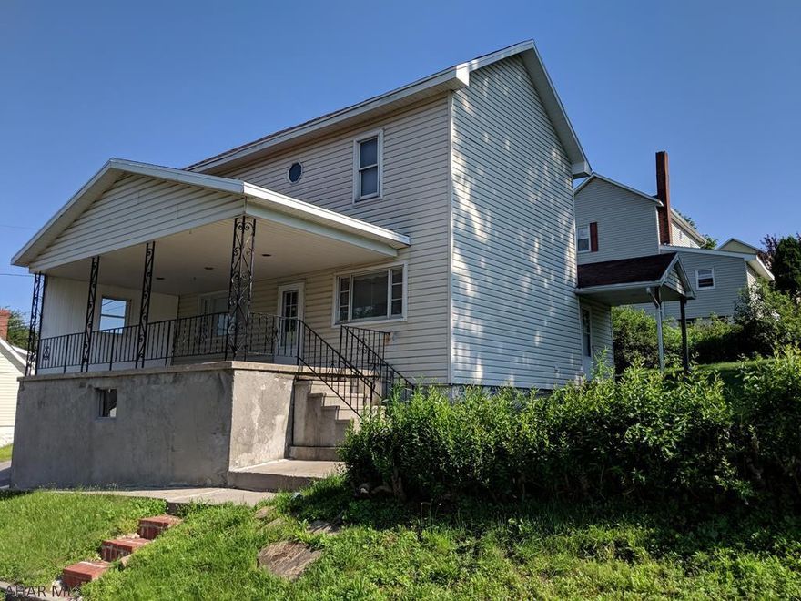 Fresh carpet and flooring - new paint and ready to move in! Corner lot with garage and offstreet parking.