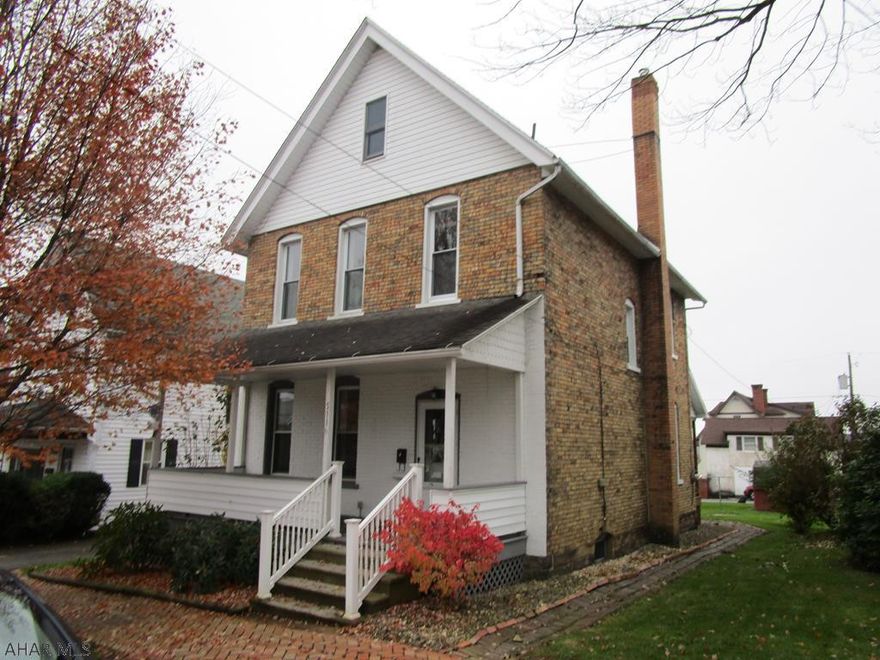 Brick two story home needs interior updating.