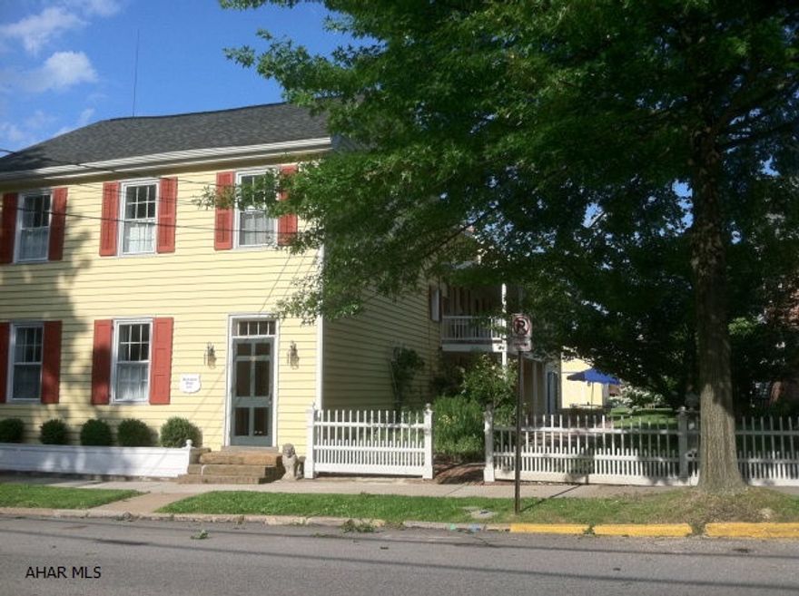 Amazing Bedford Colonial! Fabulous period details including original pine board floors, shaker staircase, fireplace mantels, hand made doors & built-ins. First floor has an entry foyer, large sitting parlor, formal DR, FR, kit built for entertaining, 1/2 bath, laundry & Den. Second level offers 4 bedrooms, studio or add. Bed, 2-full baths & addit. kit; terrific guest quarters or in-law suite. Double covered porches, period brick patio & mature landscaping. Custom designed garage w/loft & garden shed.