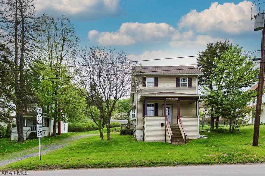 Move-in ready 2 story with brand NEW ROOF is all ready for its new owner.  From the welcoming covered front porch that invites you into the bright & comfortable interior.  Inside you will find new easy-to-clean luxury vinyl plank flooring, a freshly painted interior & new interior doors.  The main floor delivers a light filled living room, delightful dining room, family room, cozy kitchen & a convenient laundry room 1/2 bath combo.  There is an attached oversized 1 car garage offering plenty of storage.  Upstairs you will find 4 bedrooms & a full bathroom.  Additional highlights include double pain replacement windows, oil forced air heat, side deck, vinyl siding & shingle roof.  Less than 10 miles to Philipsburg, approximately 30 miles to State College & 27 miles to Altoona