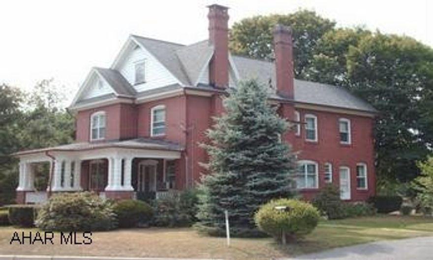 2 1/2 story brick Bellwood home, detached garage Brick Bellwood Beauty! on an extra large lot. 4 BR., 1.5 Bath, beautiful woodwork & hardwood floors. Commercial possibilities