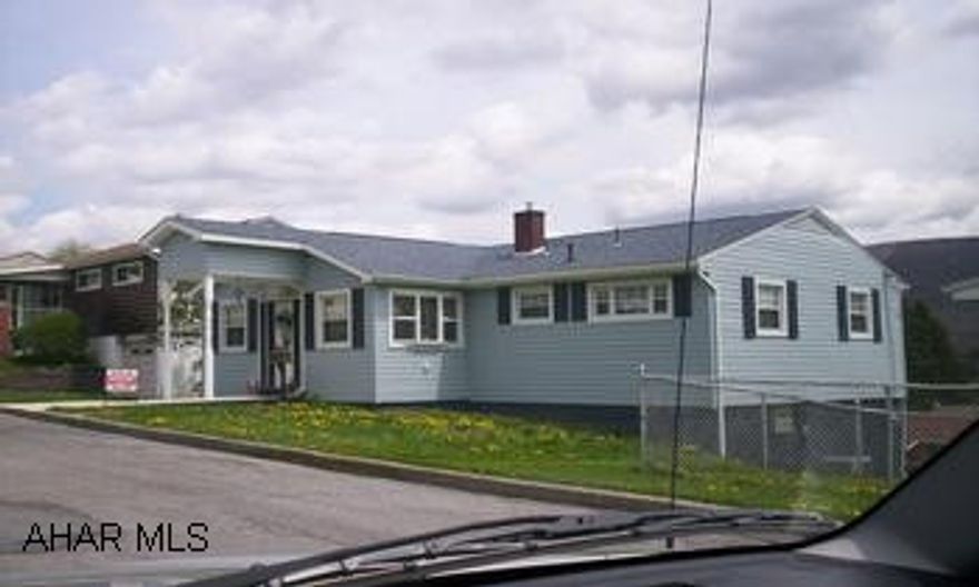 Done over - top to bottom - New vinyl siding, new roof, furnace, central AC, new bath, new floor coverings.  Has finished basement and garage.  Must see!