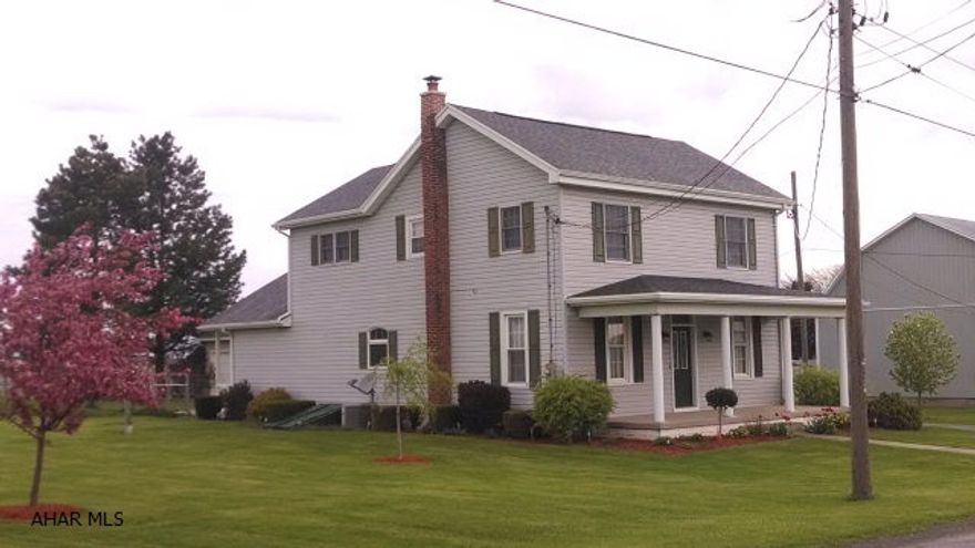 Four bedrooms, 3 1/2 baths, sits on 1.33 acres with beautiful view of the Cove. Thermal windows,CA, newer detached two car garage, first floor bedroom and bath, super layout open and bright.Additional 1.07 acres with large barn and outbuilding currently used as a bakery can be purchased with existing house and garage (TAX ID 17-7 parcel 17D) for a total of $253,500.Seller would like the right to rent back the bakery for a 1 year lease.  Property qualifies for Rural Housing Loan