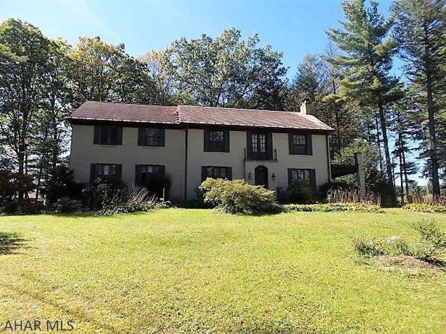 Grand, stately, Tyrone home built in 1938. 4BR, 3.5BA, all brick 2 story, 3348 sq. ft.  HW floors, inground pool, 2 car detached garage, private setting on 2.51 acres, across from Reservoir Park. $299,000.