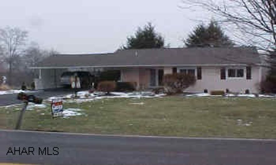 Beautiful Vinyl Sided Ranch, Finished basement- 2 car garage& 2 -carport New Siding, Newer type windows, Newer Carpet, Central Air, 3/4 acres approx., family room, beautiful yard- above ground pool w/ newer liner.Good curb appeal. New front window.