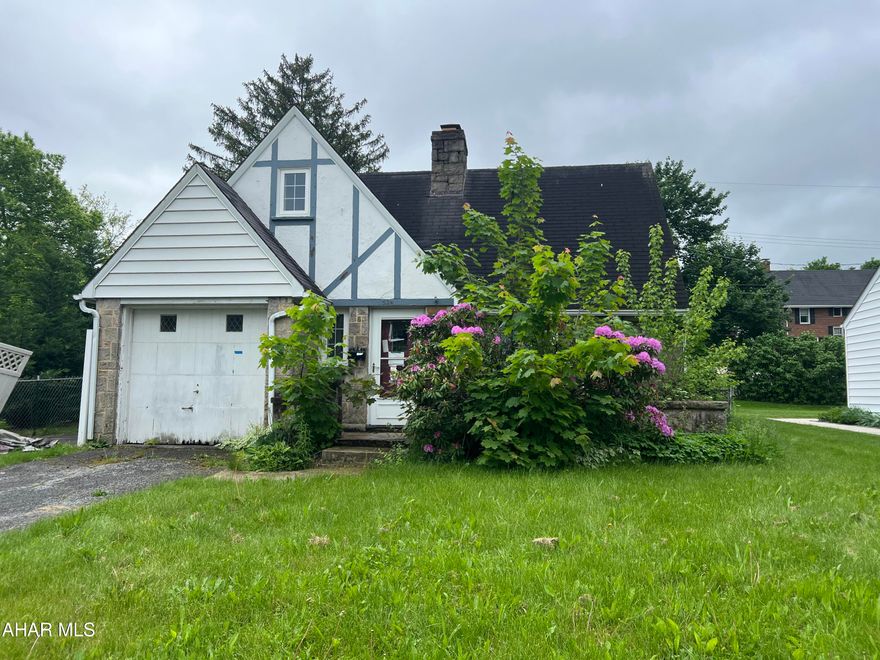 Sturdy home on a lovely street in Hollidaysburg, just needs your TLC to be brought back to life.  Large Fenced in yard.  Hard wood floors upstairs.