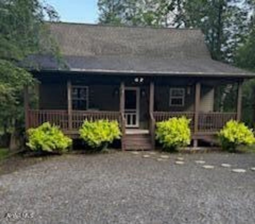 This cozy cabin is perfect for a weekend getaway or residence. This fully furnished cabin is being sold turnkey.   The main floor features a living rm w/vaulted ceiling, full bath, bedrm with EIK. Spacious loft bedrm w/sitting area and closet. Fully finished basement with family rm, bedrm, full bath, laundry area and walkout entrance to spacious yard with firepit. Large covered porches on the front and back. Amenities offer community pool w/clubhouse,  tennis, basketball and volleyball courts and dog park. Prince Gallitzen State Park is minutes away with sailing, fishing and hiking. Rock Run  ATV recreation area has lots of riding trails. Centrally located between State College and Altoona. This  cabin provides a hassle free transition. Ready for immediate occupancy.