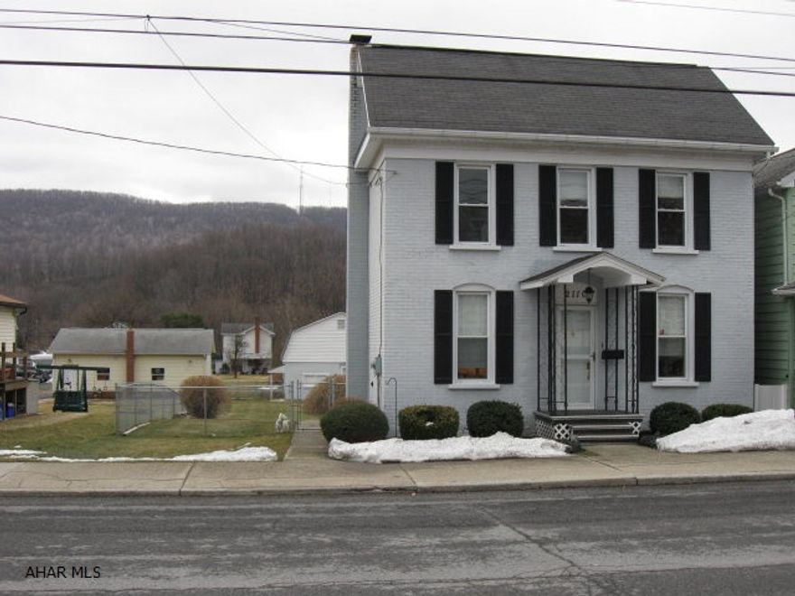 Well decorated, new carpet in living room, 2 zone gas hot water heat. Stall shower in bathroom. Nicely renovated inside and out. 2 car garage with a 2 car carport. Fenced yard.