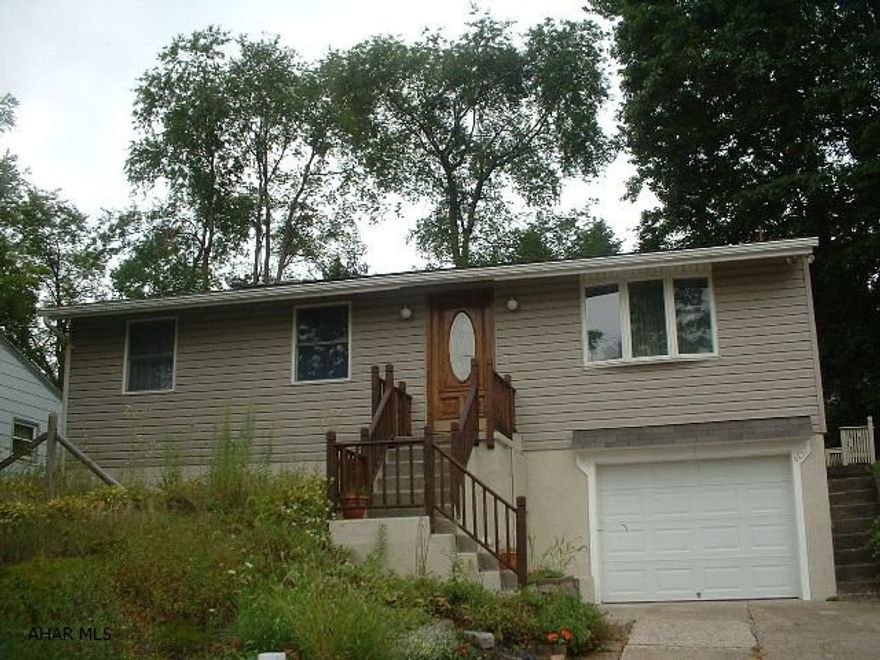Stunning and Spotless! Spacious ranch with all kinds of extras. Beautiful finished basement with seperate laundry room. Open kitchen, breathtaking family room w/hardwood floors and vaulted ceiling. So much bigger than it looks from the outside! Don't just drive by this one!