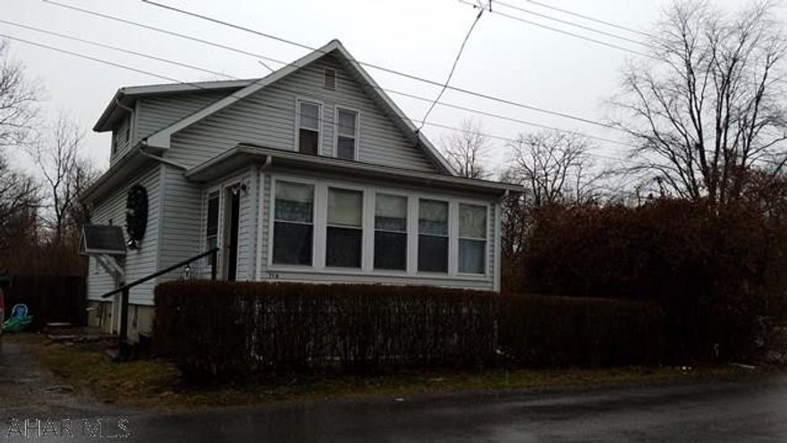 Looking for a home with lots of possibilities to make your own in the Borough? This is it.  Lots of potential with the layout and room to put a full bathroom on the 2nd floor!  Large lot with frontage on the creek. Interior needs some TLC. Quote for Flood Insurance from Young Insurance agency is $424.90 Per year.