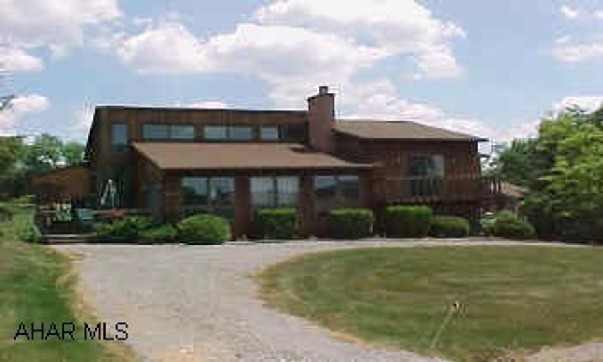 Split Level cedar sided contemporary 3 bedroom, living room, formal dining room, game room, move in condition.Hot Tub is not included in sale price!