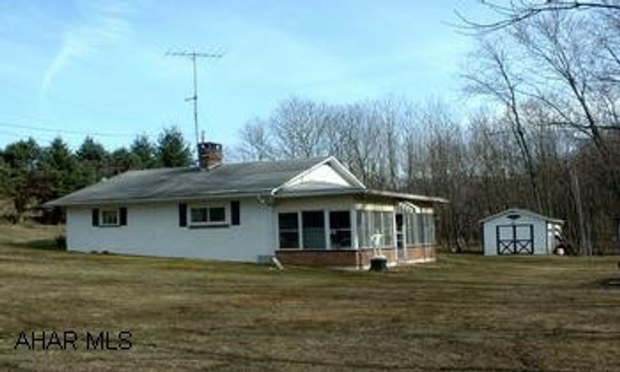 Two bedroom cottage adjoining the Juniata River. Charming well-built 2-bedroom, 3/4 bath cottage adjoining the Juniata River situated in a peaceful woodland setting located just minutes off of Rt. 30. The cottage features a living room with wood burning fireplace and an eat-in kitchen. Relax on the large screen porch and enjoy the sounds of nature. The large yard ofers lots of room for outdoor activities. All furniture, furnishings, appliances and utensils are included. All this makes a great camp for fishing, canoeing, rafting, hunting or just a restful get away.