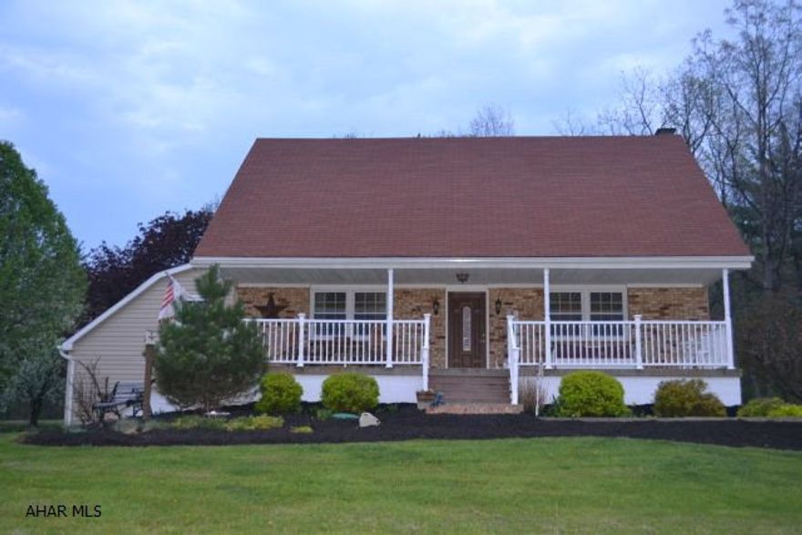 Adorable country cape cod home on 2 acres. Large front porch to sit and enjoy the fabulous view of the mountians. Lovely landscaping, hot tub to relax and enjoy music from exterior sound system, large 2 car garage and shed. Inside, country charm begins as you step in the door. Beautiful new eat-in kitchen with bar and cook top stove. First floor bath with walk in shower and new ceramic tile. Upstairs has two large bedrooms, bath, computer room and plenty of storage. The exterior is maintenance free with newer windows, siding, roof, sofit and fascia. Very close to the State Game Lands for hunters, great place to raise a family.