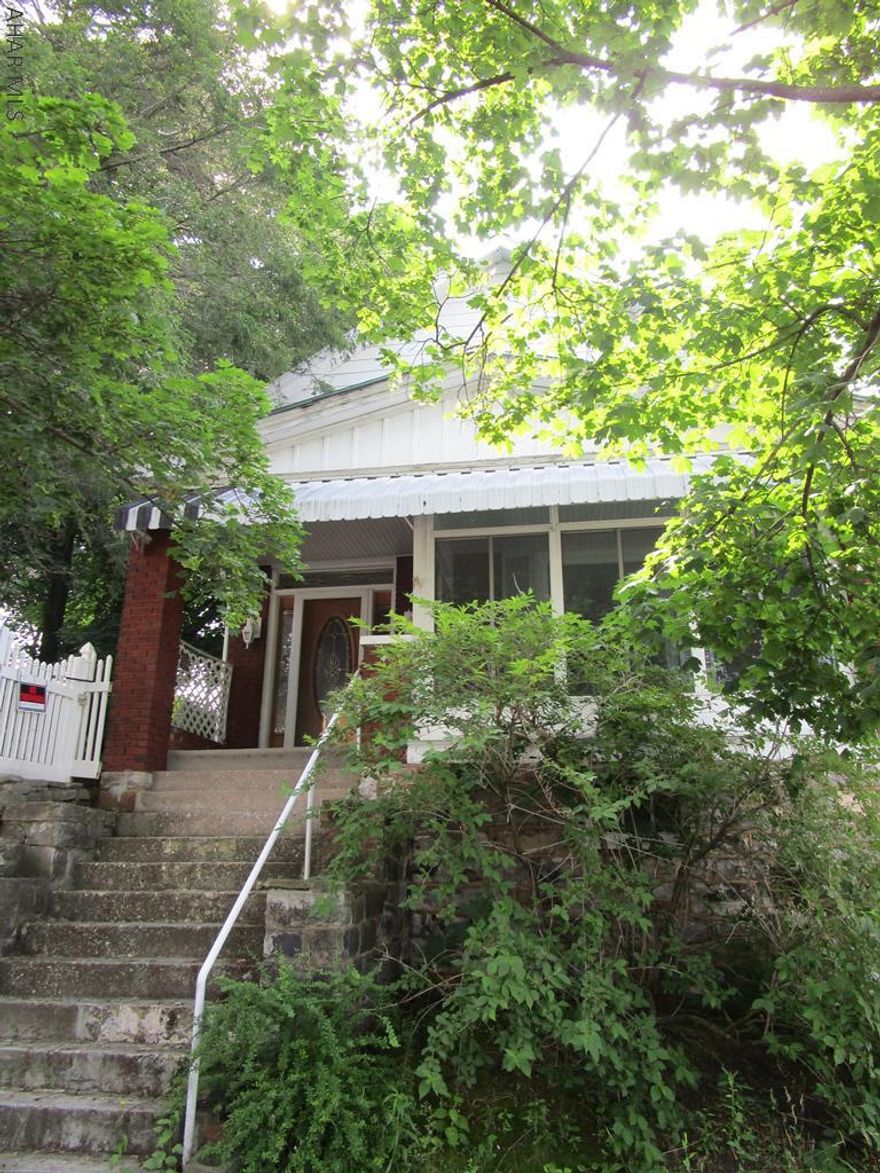 Corner home in the city of Altoona. 3 bedroom plus a bonus room on the 1st floor. Bonus would make a great bedroom or laundry room with a little work. Large lot with 1 car garage and oversized 2 car-- carport. Come take a look!!!