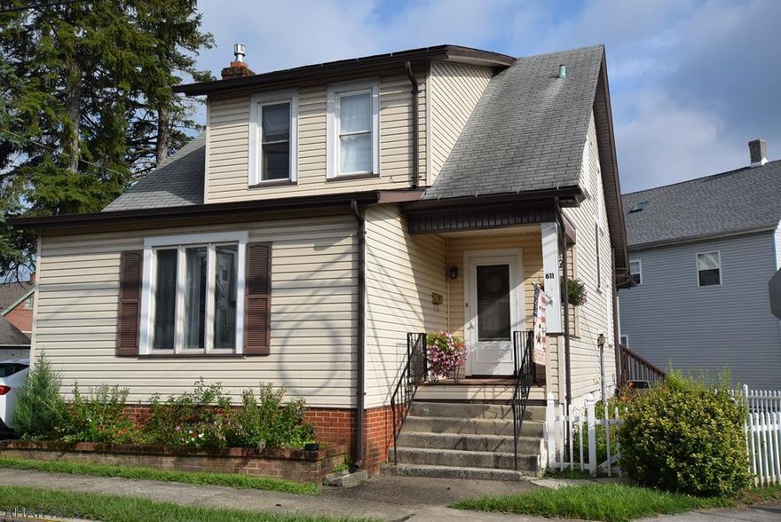 Charm and character combine to make this Borough home a pleasure to come home to. Gas fireplace.  Brand new flooring in kitchen and half bath off kitchen, and new carpeting in dining room and living room.  French doors,  nice window seat in dining room.  All bedrooms have walk-in closets.   Central air.   Cute fenced in area out back door for small children and pet safety.  Larger side yard for other activities.   Plenty of off street parking for multiple vehicles.   Large shed for bikes and lawn care equipment.  Walking distance to YMCA, schools, and downtown Hollidaysburg events.  Qualifies for zero money down USDA loan.  ** HOME WARRANTY INCLUDED**