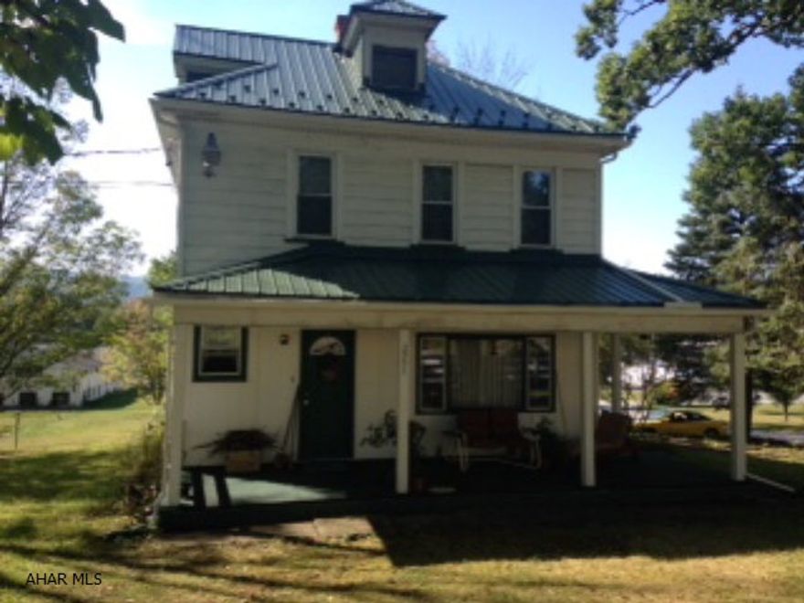 Huge home with large lot in Hollidaysburg school district. Large rooms, needs some cosmetics but all mechanics have been updated. New metal roof, updated electric. Newer furnace. Double pane windows.