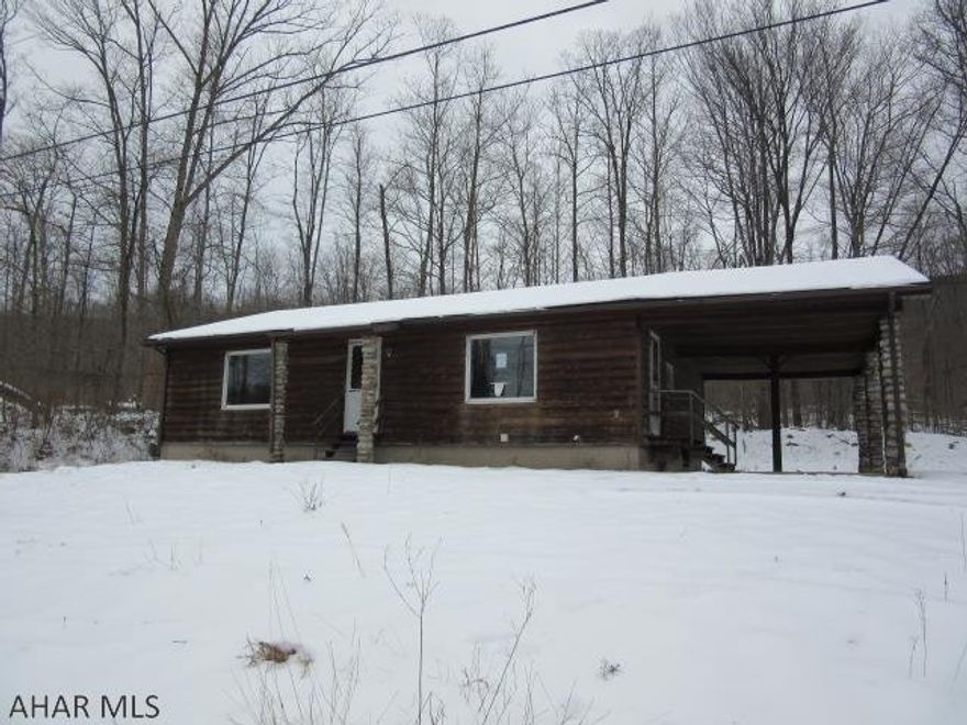 Private wooded 6 acre lot just outside of Mount Union- ranch home with 3 bedrooms, 1 baths, partially finished basement; Employees and family members residing with employees of JPMorgan Chase Bank, N.A, its affiliates or subsidiaries are strictly prohibited from directly or indirectly purchasing any property owned by JPMorgan Chase Bank, N.A.