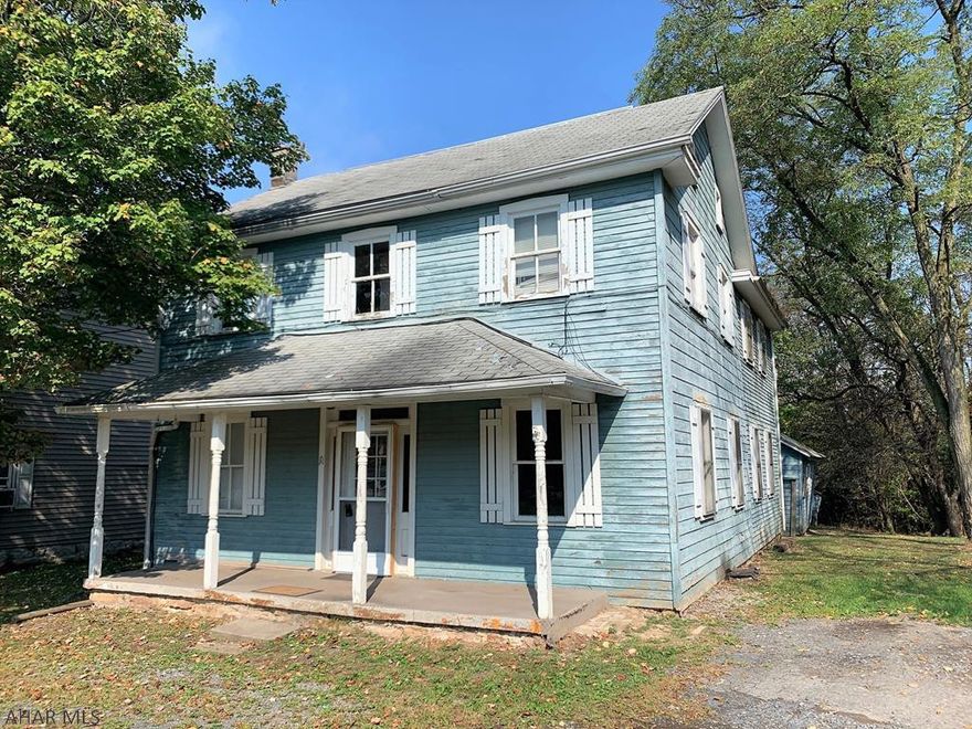 Two-story home situated on a large 1.248 acre lot with public water and sewer. Home is in need of updates and remodeling and would be a great candidate for an investment property, an owner occupant remodel project or a duplex rental conversion. It has a living room, dining room, kitchen and bath on the main level. Four-bedrooms, a den and a full bath on the second level. Full attic and a partial basement. Updated oil forced air furnace and 200-ampere electric. Convenient location close to I-99, Route 220, Bedford and Altoona.