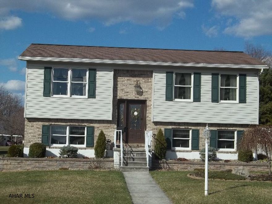 Absolutely move-in ready 3 BR, 2 BA house with energy efficient a heat pump, central air, small two story barn & shed - both with electric, and beautiful landscaping .  All this on a double lot (two separate deeds) in Roaring Spring Borough.