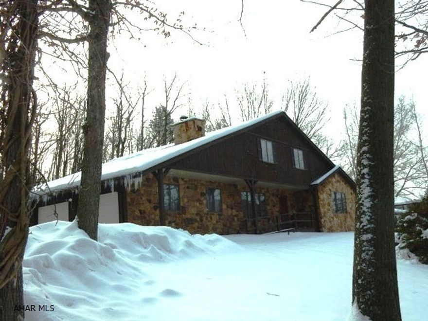 Custom built home on large secluded lot. This home features all the extras that you pay a premium for in todays market. Large rooms, all appliances included, custom fireplace, private rear sunroom AND finished lower level. The sellers realize some updating is needed and with an acceptable offer a flooring and paint credit will be offered !!!