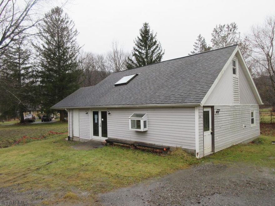 1.5 story vinyl home on 0.62 acre in Juniata Gap area and very close to PSU Altoona. Open concept kitchen area with center island/breakfast bar and adjoining dining area with overlooking loft. 2 first floor bedrooms, bath and office/den plus 2nd level loft area for possible 3rd bedroom. Needs some TLC, but nice area and loads of possibilties. Property sold AS-IS. Seller will make no repairs. Offers must be submitted through HUD approved broker. Buyer pays both transfer taxes. Exclusive Agency. Equal Housing Opportunity. Marketed by Olympus AMS www.olympusams-re.com. www.HUDHomestore.com