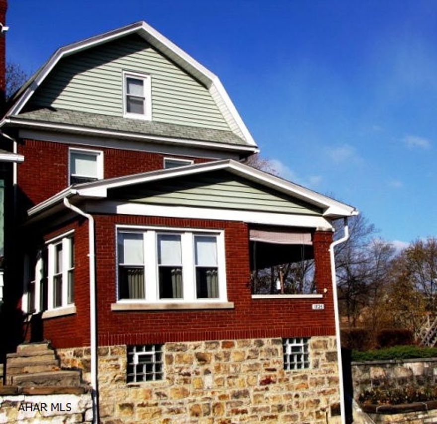 Well maintained, sturdy brick house built in 1924. They are not building homes like this anymore! Detailed with nice woodwork and built-ins. Ready to move into. Gas fireplace in large living room, sunroom has a great view of city. Classic brick house at a great price. Side yard included with shed and garden area.