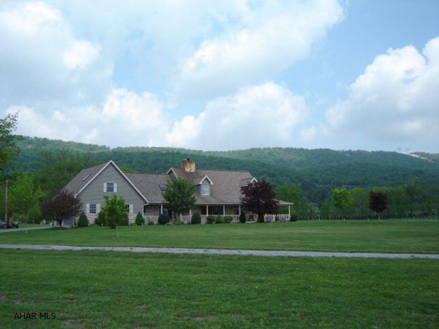 Centrally located between Hollidaysburg, Huntingdon and Tyrone. This 35 acre horse farm features a beautifully constructed 1.5 story custom home with 2 master bedrooms, hickory kitchen with breakfast area, a guest room with a kitchenette and private bath, and much more! Too much to list..  This horse lovers dream has an 8 stall barn with 1/2 bath and lounge/office area, a 70 x 156 indoor riding arena with 2 additional stalls a 120 x 240 outdoor arena and lots of pasture space. Call for more details.
