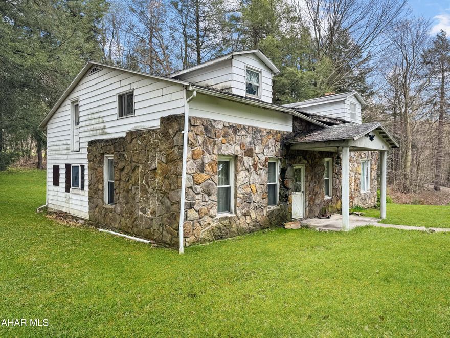 Welcome to 377 Bracken Street in the Central Cambria School Districts, Jackson Township. This 3 bedroom, 1 bathroom home holds an endless amount of character but it could definitely use some love! Take on the challenge to renovate this home or demolish it and build on this beautiful & private 1.15 acre lot! Condition of utilities are unknown but there is public water & sewer hooked in. The property is in need of a new roof and various other possible items. The basement does take on water. Best possible use most likely would be to demolish & start fresh but come and determine that for yourself! Call today for more info!