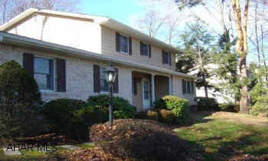 Lovely 2 Story, Stone fireplace, wall to wall carpeting, ceramic tile flooring, vinyl flooring, brick/siding exterior. Approx. 1/2 acre wooded lot. Single family property, Area: Altoona, Highland Park. Newly updated 2 story in Highland Park area, Private, wooded, half-acre lot, large master with master bath, large covered patio(15x20)  family room with stone fireplace, 1st floor laundry with half bath.