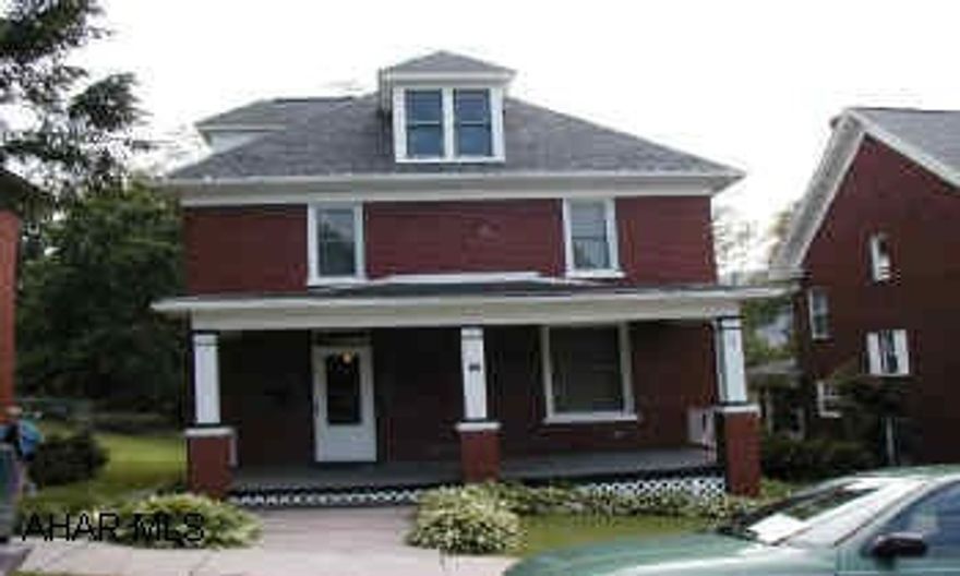 2 1/2 Story Brick. Renewed 40 year roof/windows, spouting, plumbing & wiring.