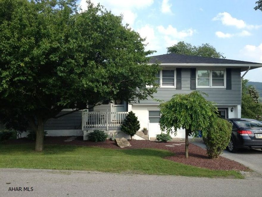 Multi-level 3 bedroom home with large fenced yard on a corner lot. Tile floor in kitchen, and all stainless steel appliances. All bedrooms have hardwood flooring. Family room, 1/2 bath and laundry room in lower level.