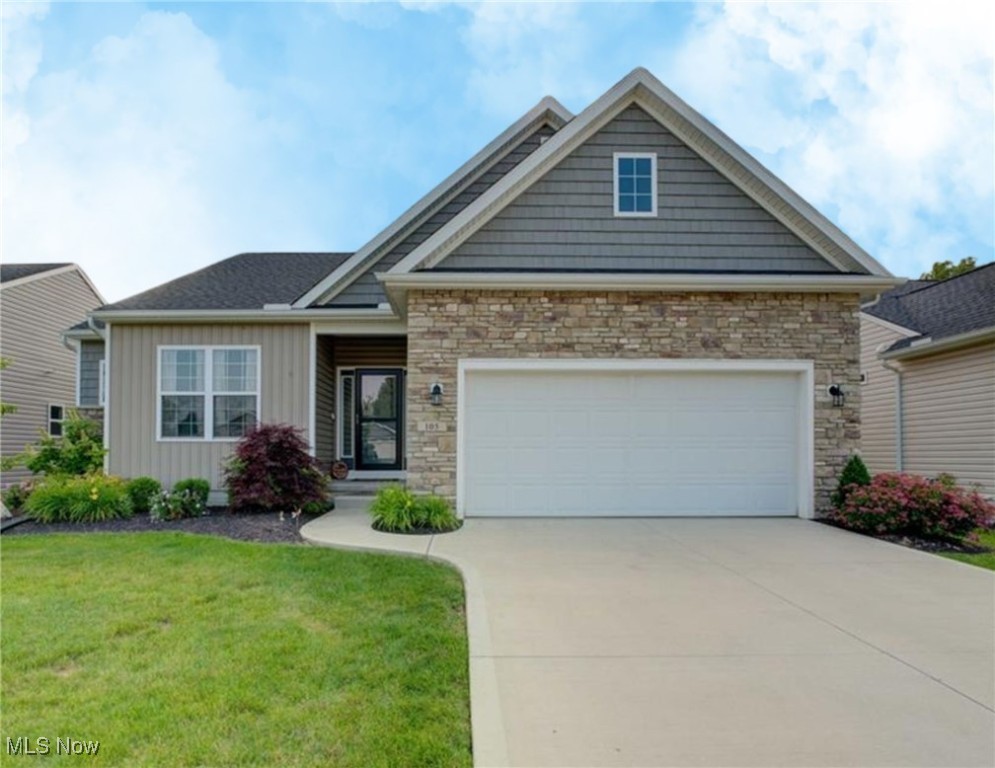 Fall in Love at First Sight! This stunning 3 bedroom 2 bath ranch home brings serious curb appeal with its charming landscaping. Built in 2022 by Yost Construction. Step through the front door into a spacious foyer where 9-foot ceilings and sunlight greet you like an old friend. The open-concept great room is an entertainer's dream to gather round the stone gas fireplace for game night or curl up with a good book. Easy cleaning with the gorgeous wood-look LVT flooring. The dining area flows effortlessly into the kitchen and living room, and there's even a patio door that leads to your covered back porch. Your new favorite coffee spot! The kitchen? Oh, it's chef's kiss! Quartz countertops, classic subway tile, sleek stainless steel appliances, and plenty of prep space Just add snacks and you're good to go. The guest bedroom features its own walk-in closet (no fighting over space here!), while the owner's suite is a sun-soaked sanctuary with a luxe private bath, double sinks, walk-in shower, and a walk-in closet that could host its own HGTV episode. Need more space? The laundry/mudroom has three closets (yes, three!), and there's a full basement ready for your storage, gym, or movie cave dreams. The garage is a generous 21x23 with an extra 6x6 storage nook perfect for bikes, tools, or holiday decorations - And here's the cherry on top: no mowing or snow shoveling ever again! The HOA handles it all for just $150/month. Carefree, all on one level living, here you come! Schedule your home tour today!
