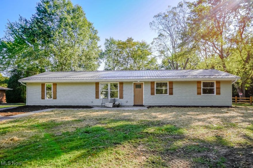 Stunning fully remodeled ranch in Nordonia Hills Schools! Renovated from top to bottom, this home features a new steel roof, gutters with leaf guard, ProVia windows, siding, garage door with opener, and an asphalt driveway. Inside, you’ll find all new flooring, lighting, doors, plumbing, furnace, A/C, and a 200-amp meter and panel.

The vaulted open-concept design connects the living room with the eat-in kitchen, showcasing new cabinets, quartz countertops, stainless steel appliances, a subway tile backsplash, and a center island with counter seating. A new sliding door opens the space to the patio, perfect for outdoor dining and entertaining.

Down the hall, the master suite includes a walk-in closet and private full bath with a double vanity. Two additional bedrooms share another beautifully updated full bath. A laundry and mudroom combination with a built-in boot bench leads to the rear-load two car garage.

Situated on a spacious half acre in a prime location close to shopping, dining, and the interstate, this move-in ready home is one you won’t want to miss.